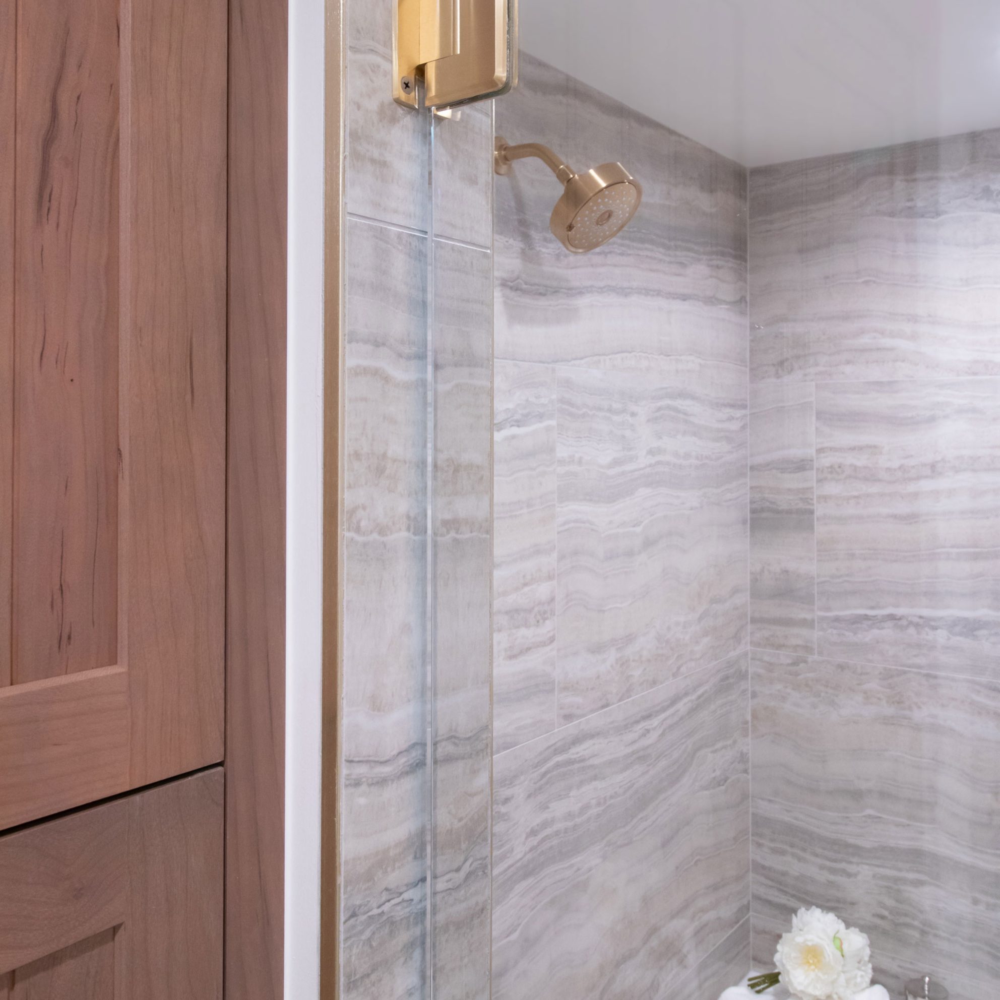 Low iron glass, satin brass finish hardware